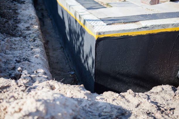 Professional Basement Waterproofing technician working in Odenville, AL